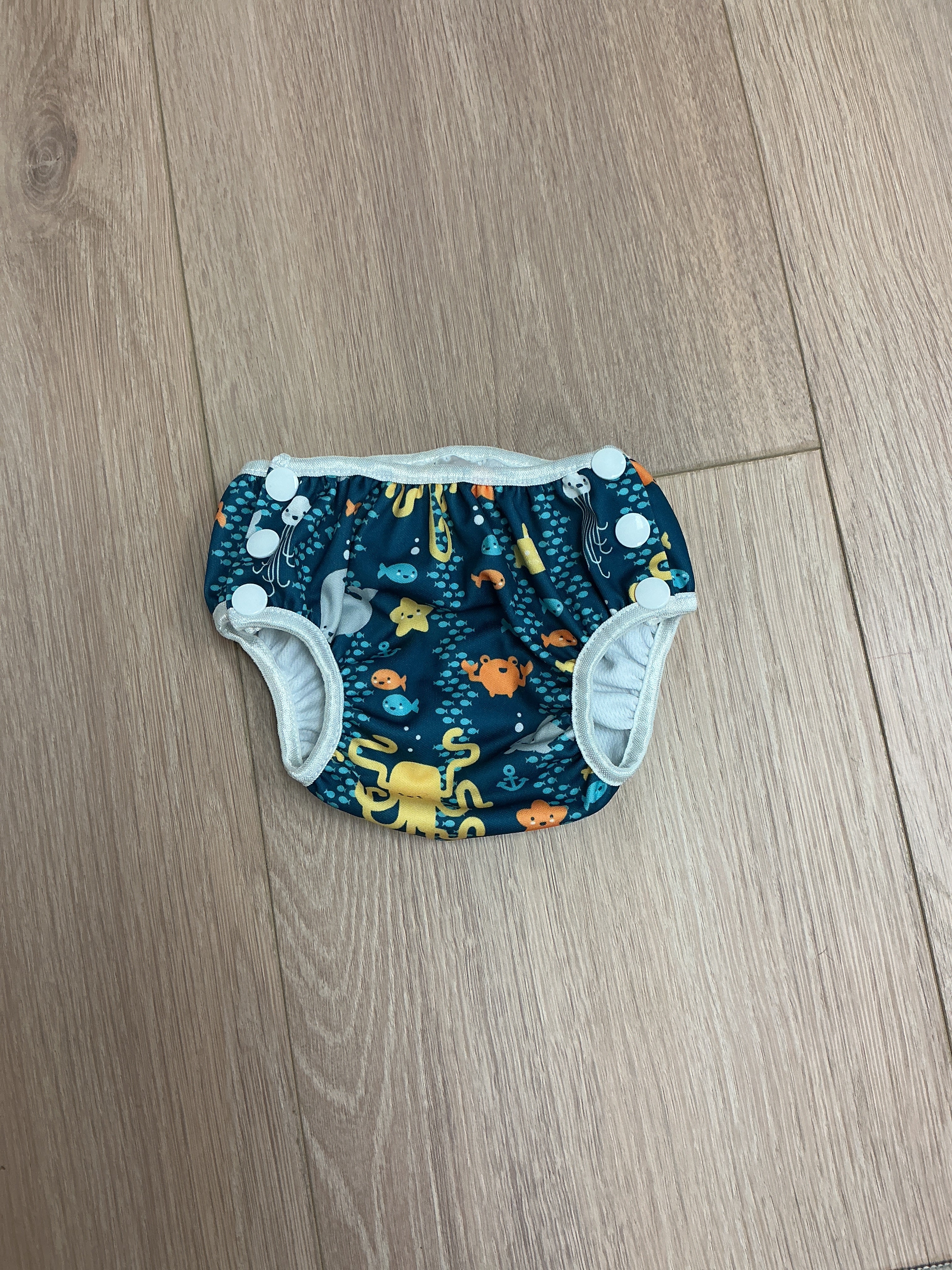 Bumpkins blue fish diaper cover S
