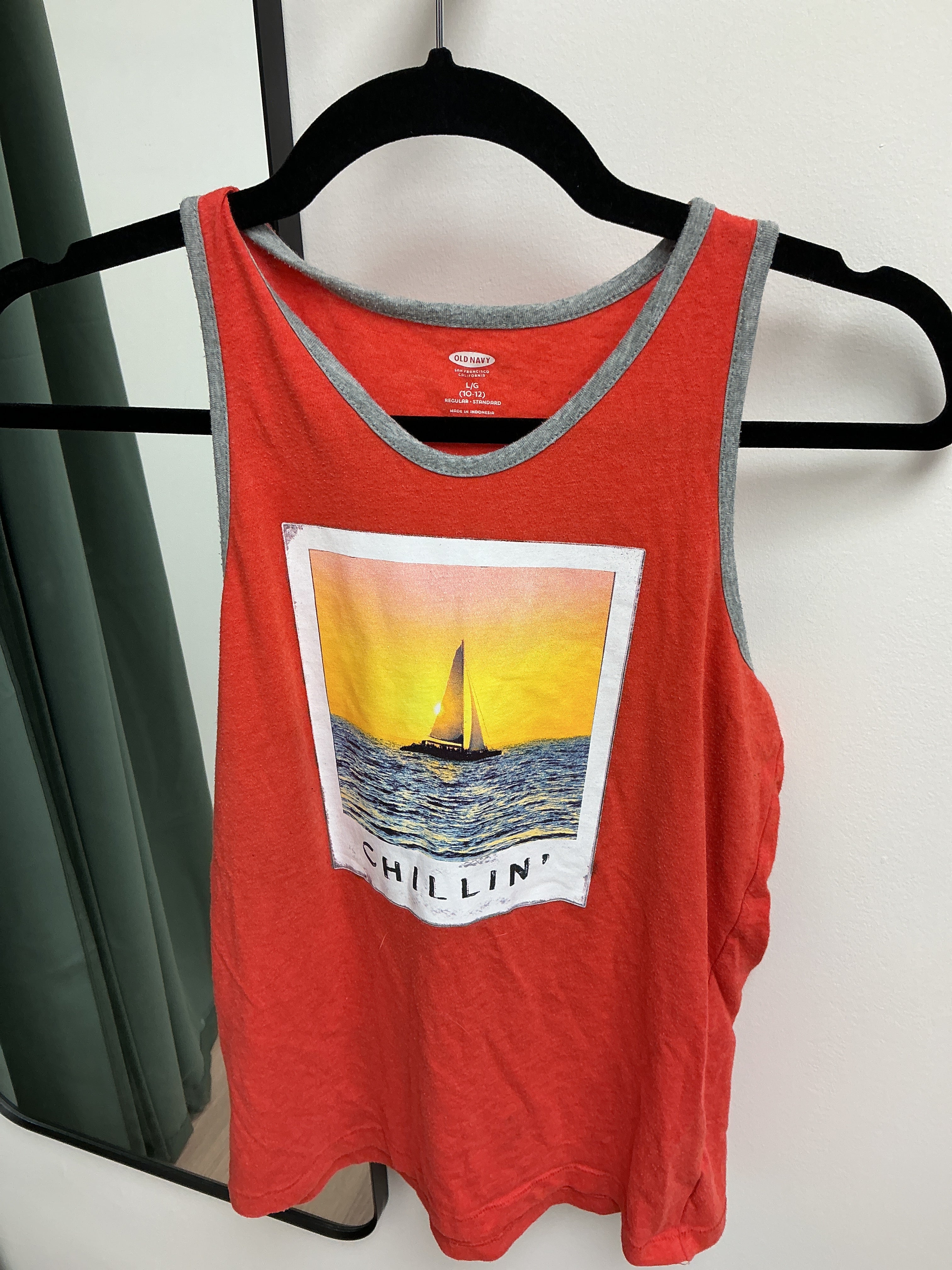 Old navy orange chilling sleeveless shirt 10/12